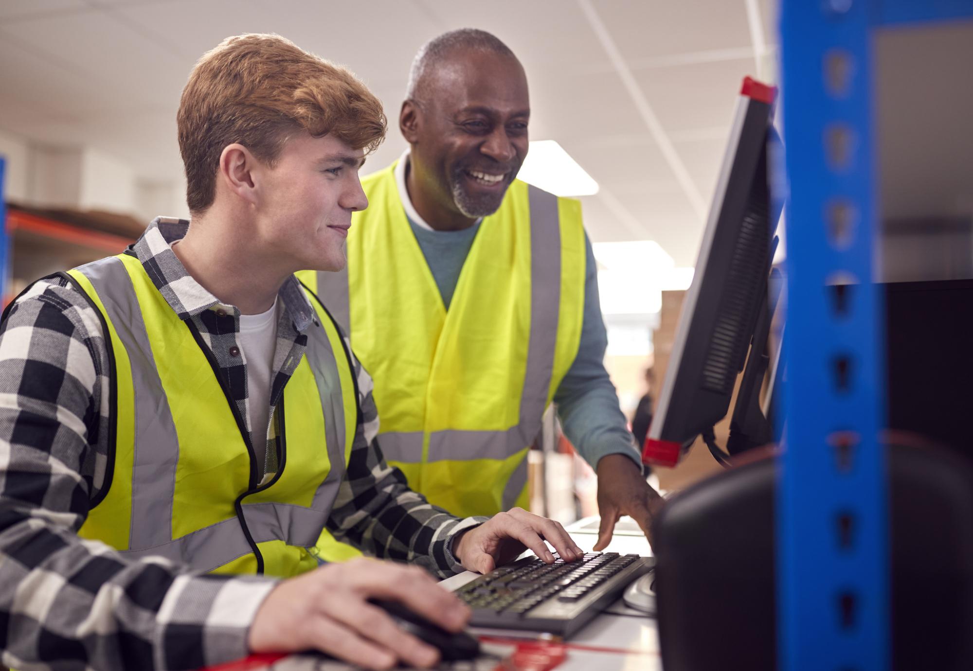 Student on work experience with his mentor