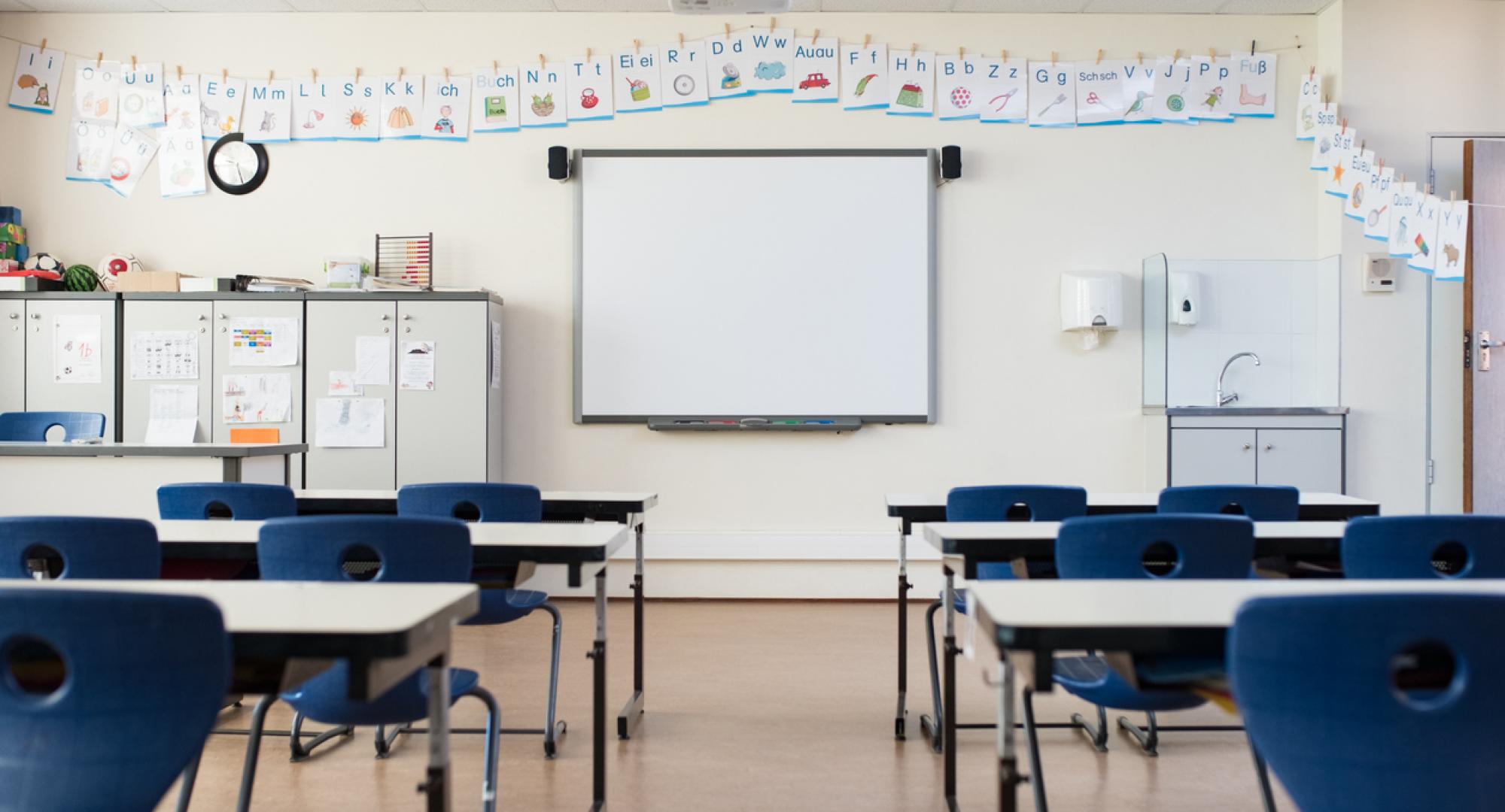 Empty classroom with whiteboard