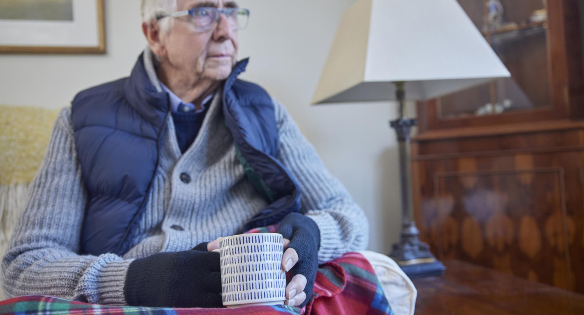 Older man struggling to keep warm in the winter