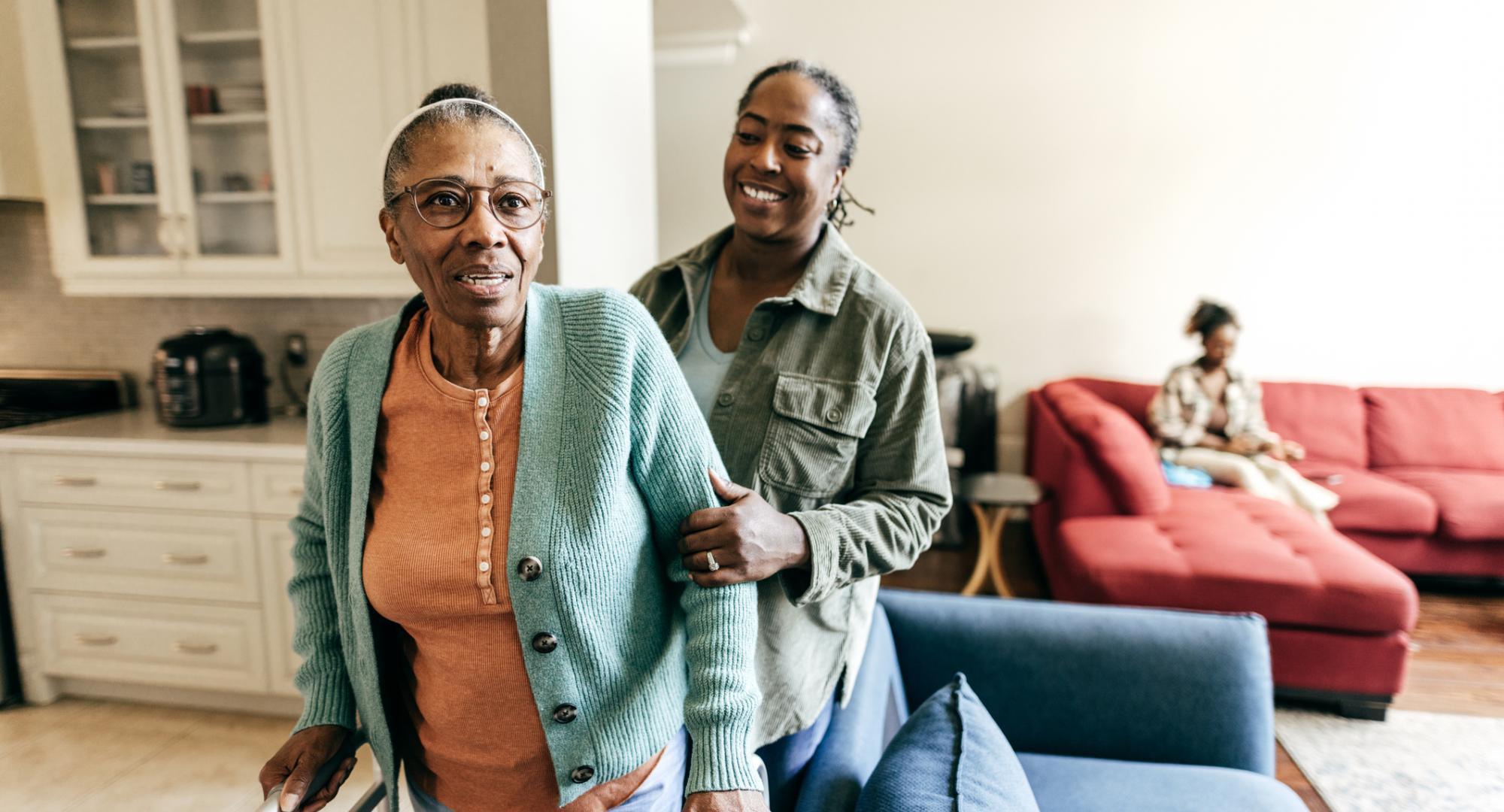 Woman taking care of aging parent