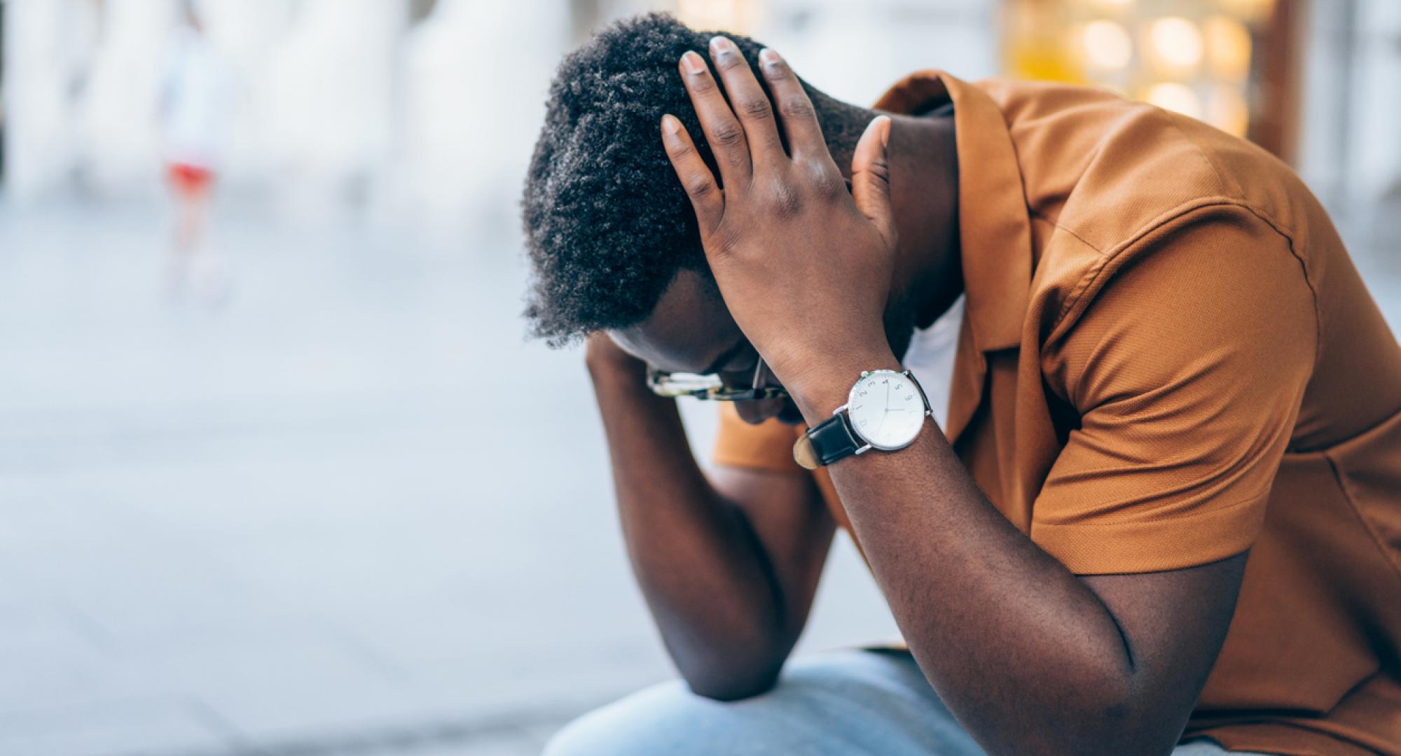 Young man contemplating suicide