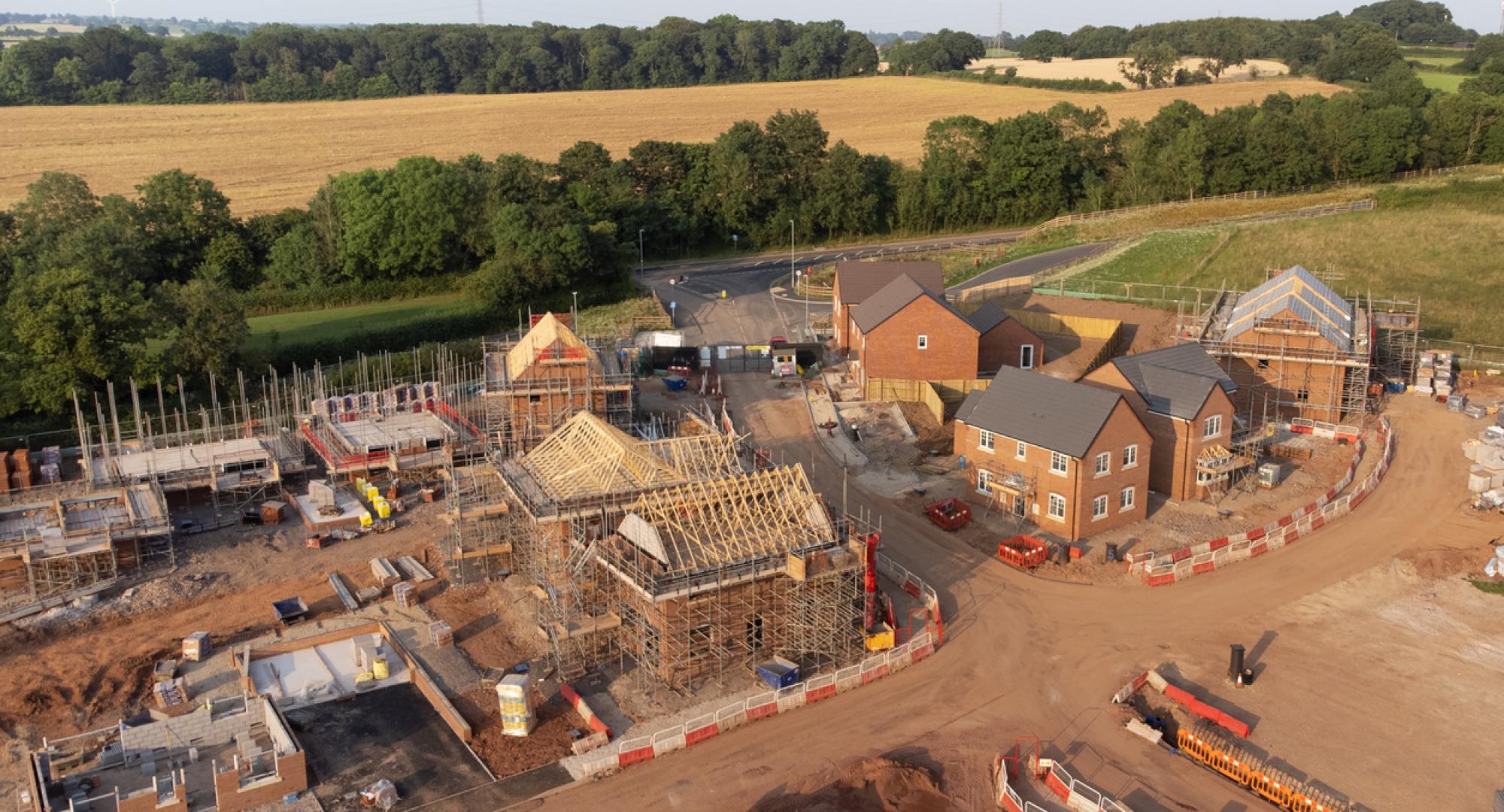 Aerial view of new build housing construction site in England, UK