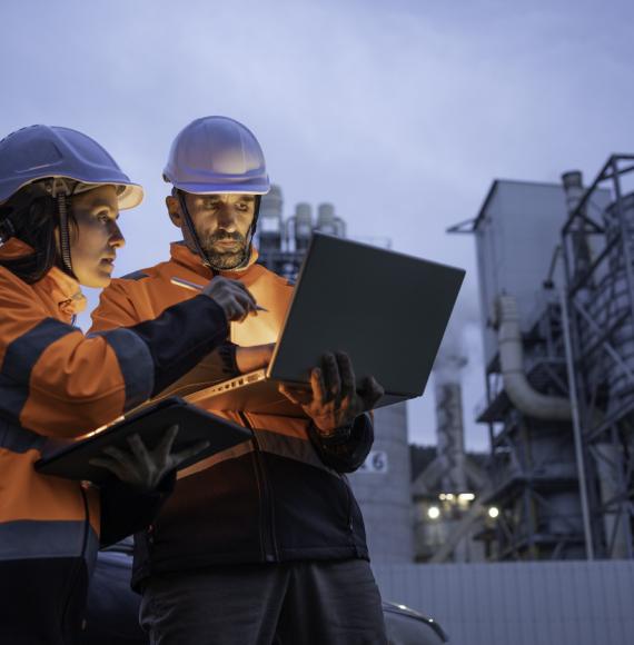 Engineers working late in power plant