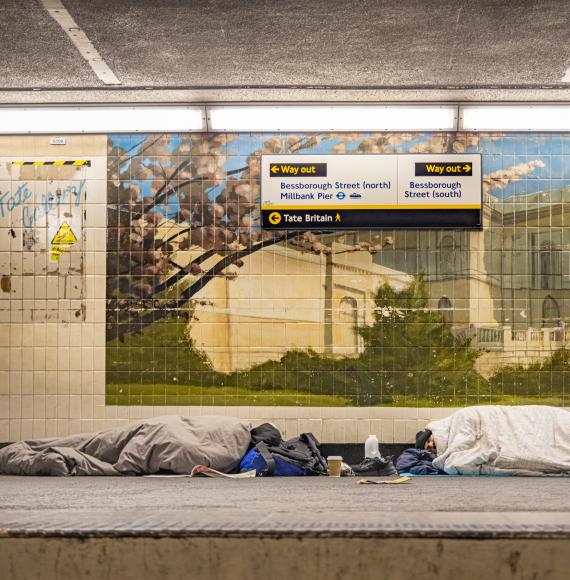 Homeless people sleeping in a London tube station