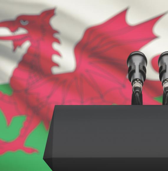 Welsh flag behind a lectern