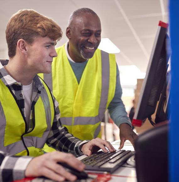 Student on work experience with his mentor